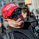 A different MAGA-hat-wearing guy